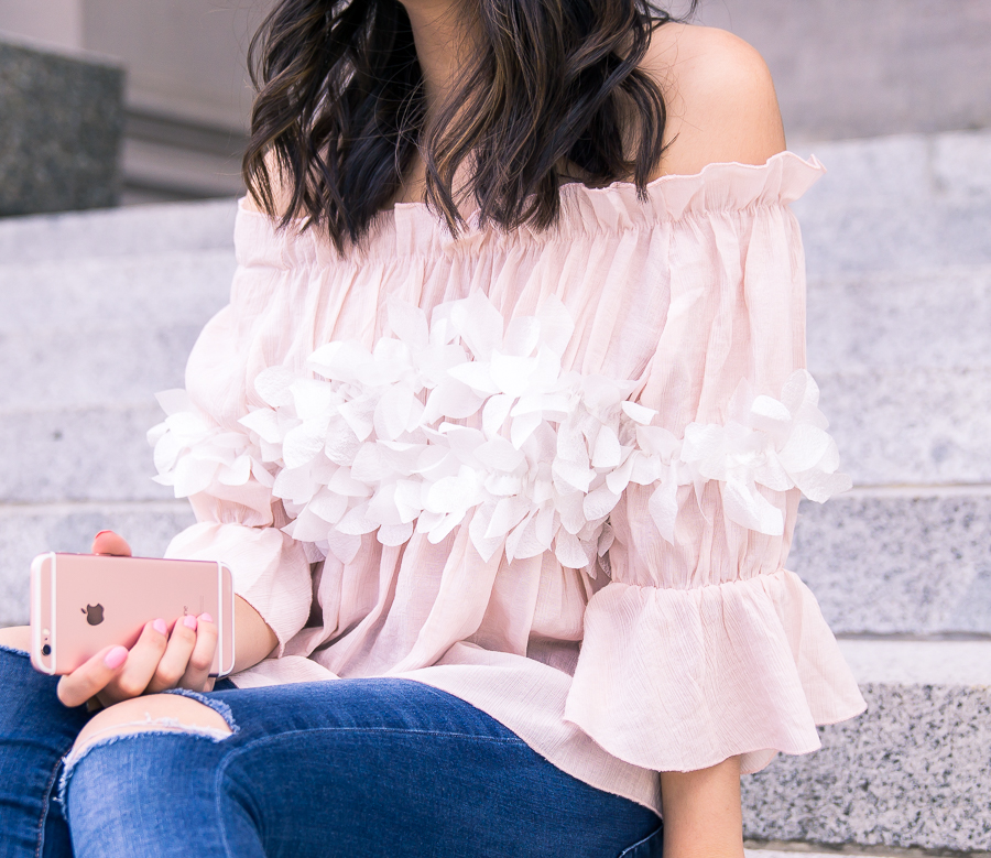 Cute and casual summer outfit wearing a blossom cute off the shoulder top