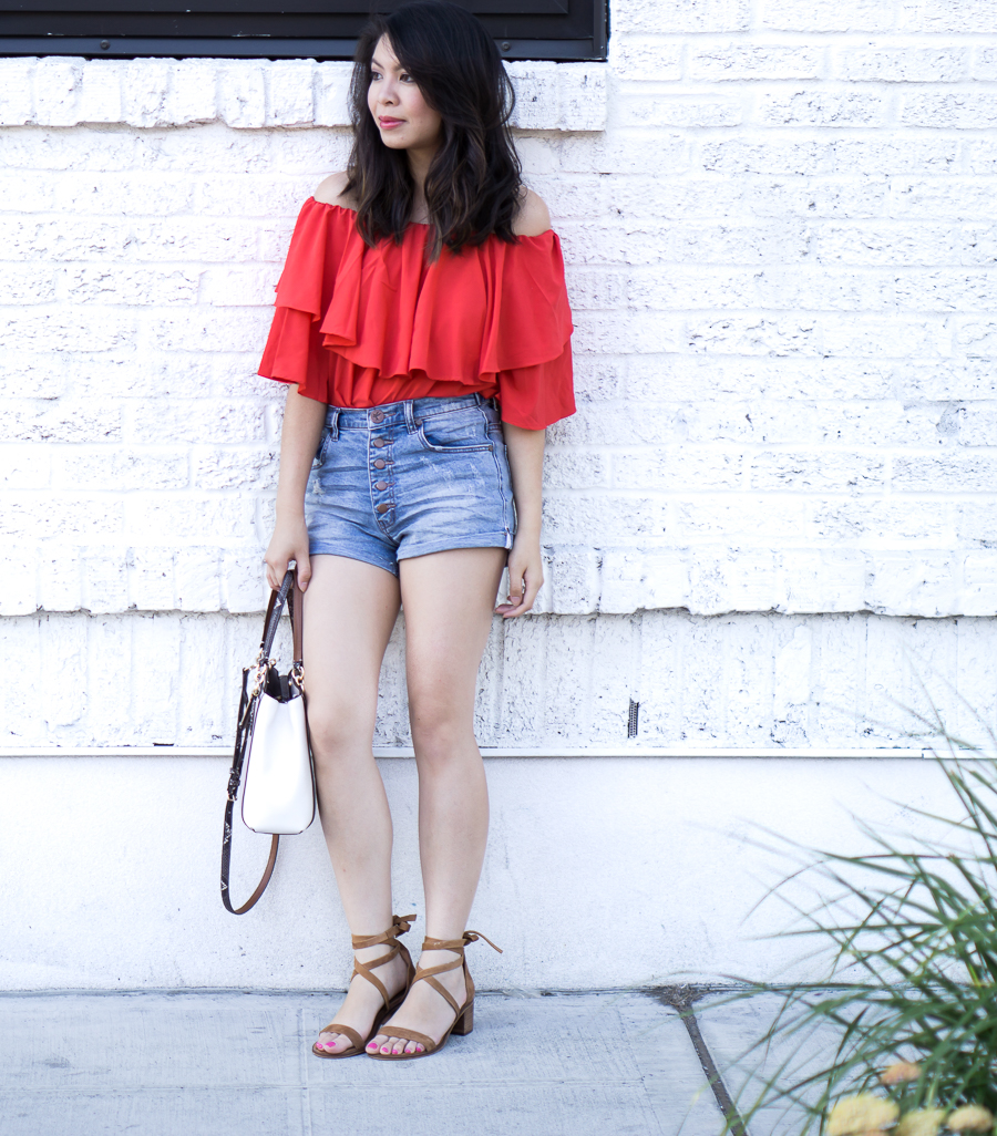 Denim shorts outfit with red off the shoulder top