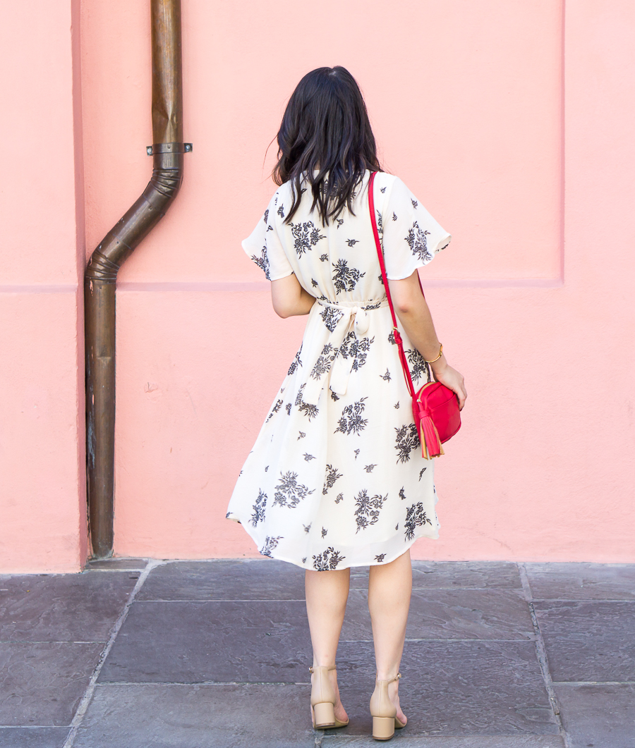 Floral wrap dress with ankle strap sandals in New Orleans French Quarter | Petite Fashion Blog