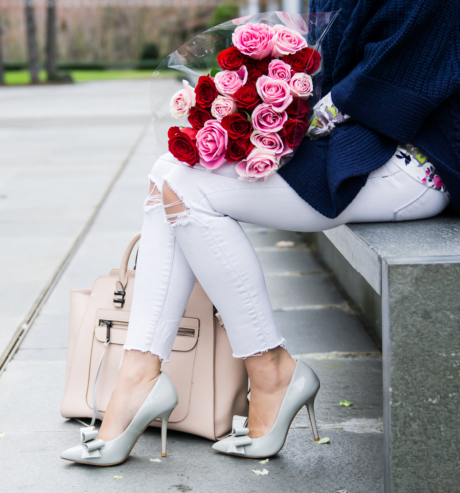 White jeans, bow pumps, roses