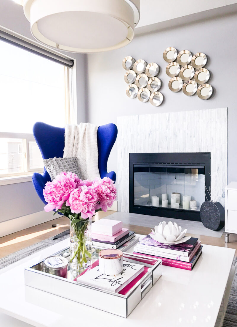 Modern chic living room, blue egg chair, peonies, Seattle fashion blogger