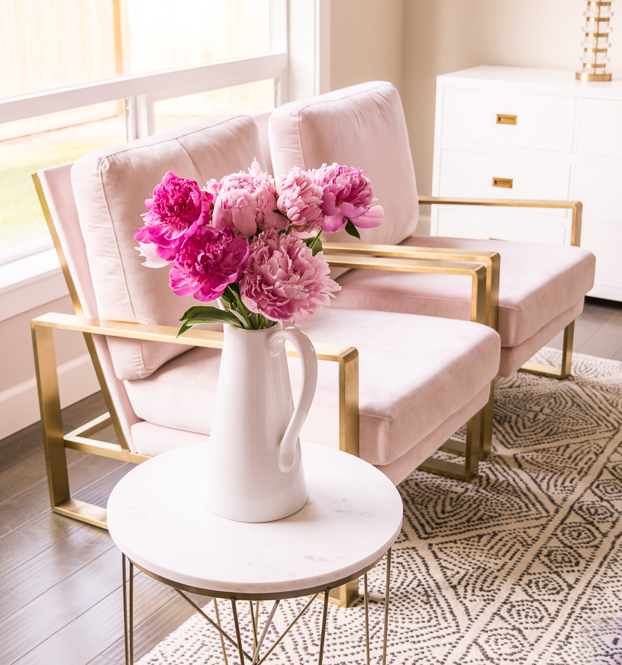 Living room pink chairs, blush chairs, gold legs, pink peonies