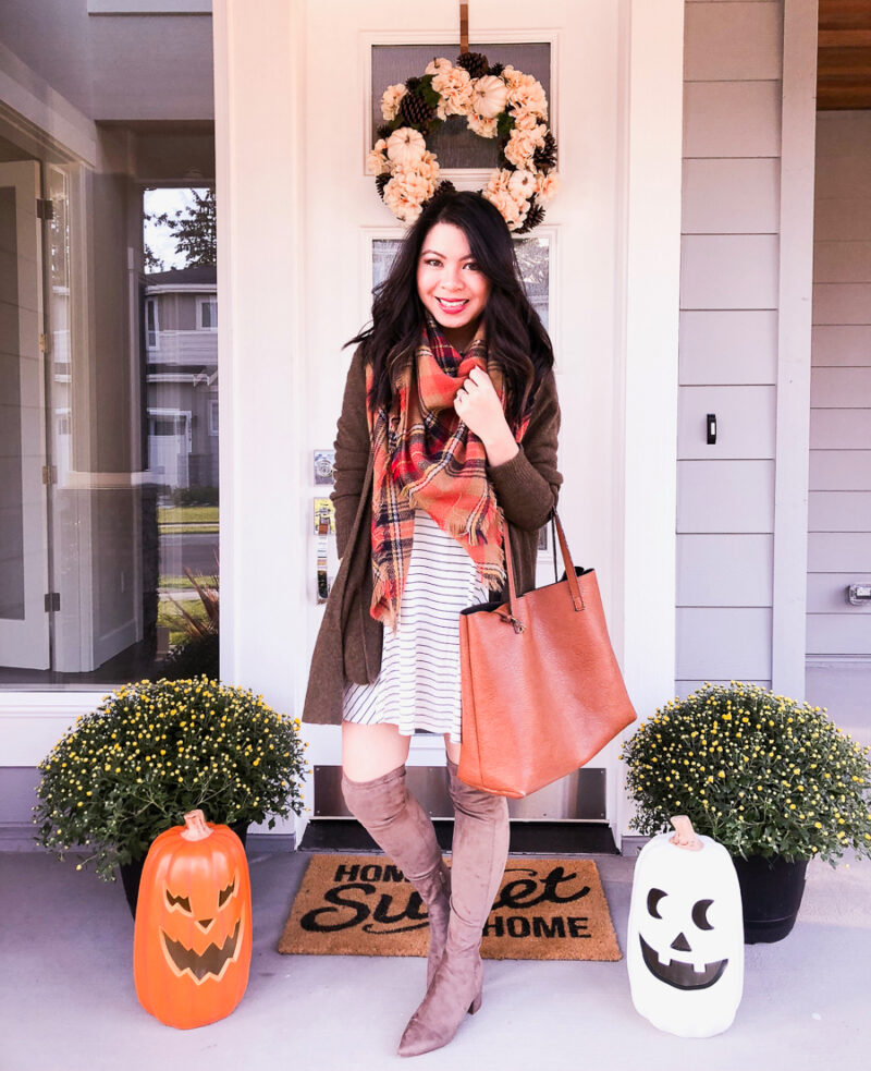 Fall front porch with fall wreath, pumpkins, Home Sweet Home doormat from Target, Just A Tina Bit Seattle fashion blogger is wearing a cardigan, plaid blanket scarf, striped dress, over the knee boots