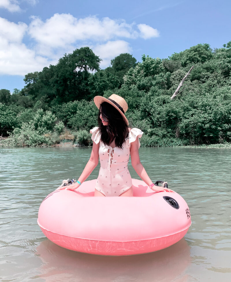 Austin bachelorette party ideas, things to do, river floating on Lady Bird Lake, bridal white swimsuit, one piece