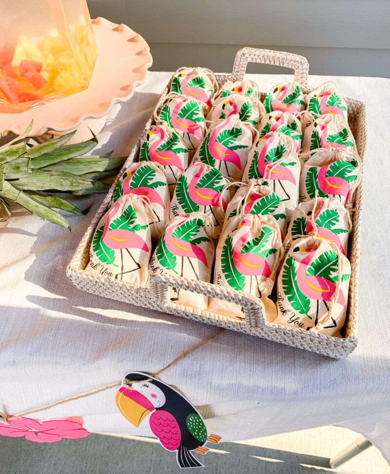 Tropical, Hawaiian theme bridal shower party, bridal shower decoration ideas, flamingo thank you bags, bridal shower favors with pineapple cake and Hi-Chews