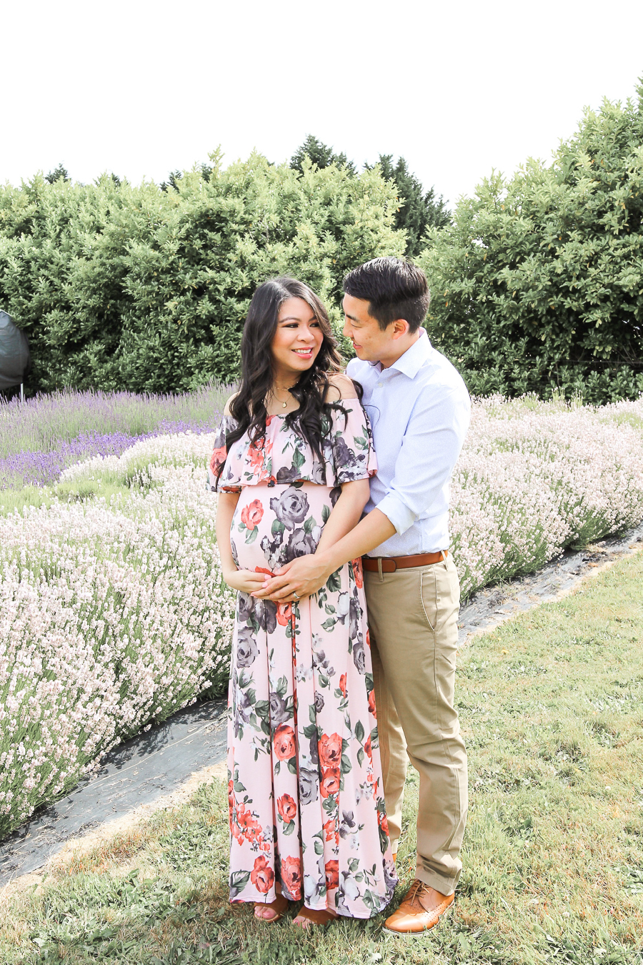 How to financially prepare for baby, maternity photoshoot at a lavender field in Olympia called Evergreen Valley Lavender Farm, wearing Pink Blush Maternity maxi dress with floral print and off the shoulder