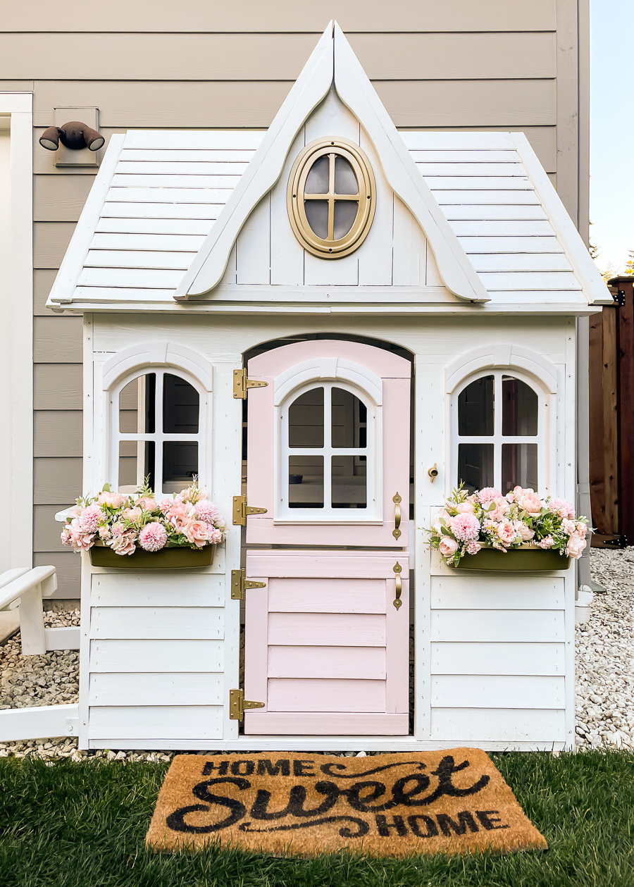 DIY playhouse, playhouse makeover using Behr Ultra White paint, Sherwin Williams Charming Pink, and Rustoleum gold spray paint