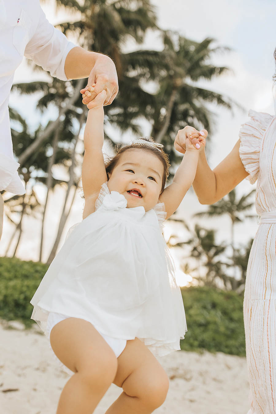 Swinging toddler pose, beach photos