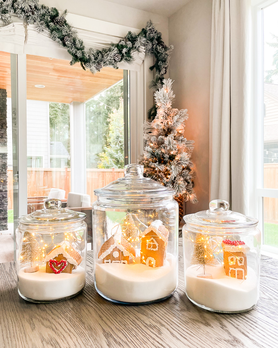 DIY Christmas decor, Christmas village jars, gingerbread house jars, gingerbread house with sugar and fairy lights in glass jars, Christmas jar centerpieces