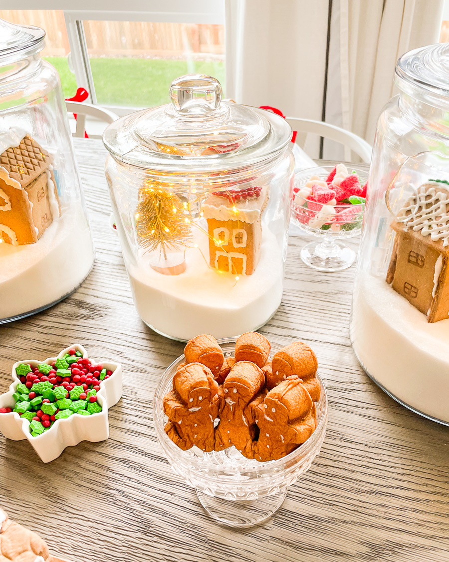 gingerbread village jars, gingerbread house glass jars with sugar and fairy lights, gingerbread me peeps