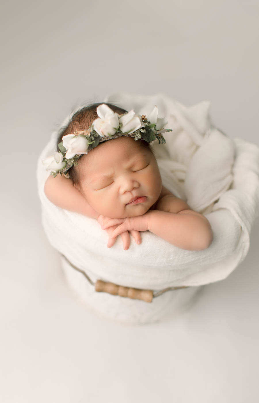 Seattle newborn photos studio with client wardrobe, Seattle mommy blogger, newborn in bucket photo with flower crown
