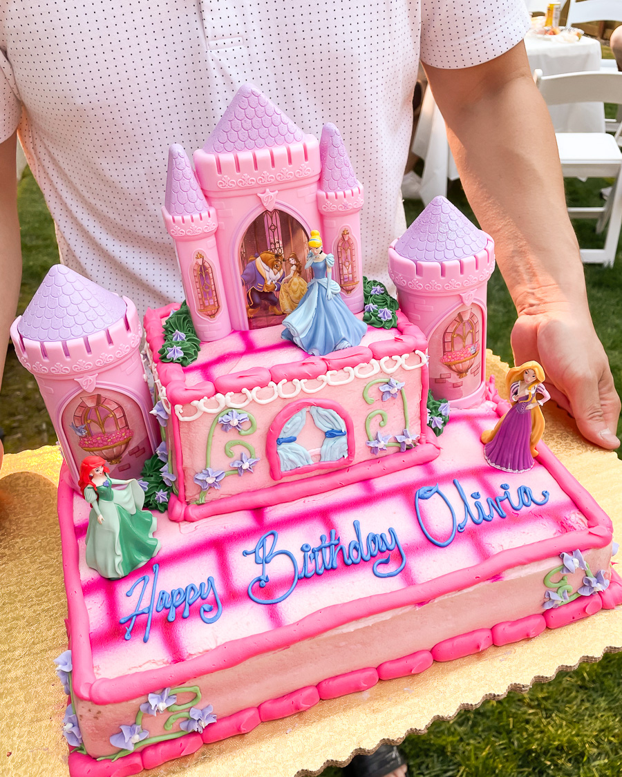 Disney princess birthday cake, Disney princess cake toppers with Cinderella, Rapunzel, Ariel, and castle
