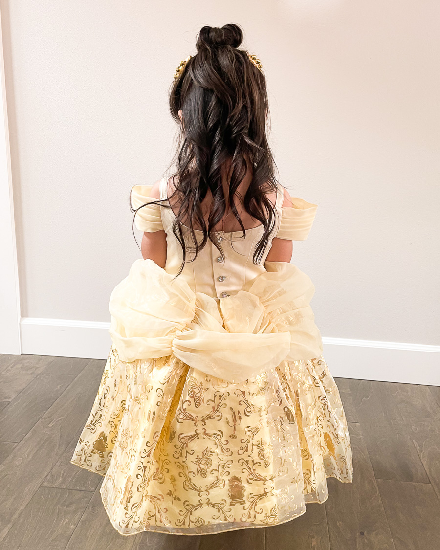 Toddler dressed up as Belle, Belle hair style - hair bun with curls, Belle costume for disney princess birthday party